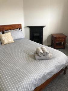 Кровать или кровати в номере Oyster Catchers