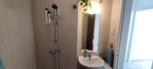 a bathroom with a shower and a sink at Mediterranean Seaside Authentic Beach House in Polis Chrysochous