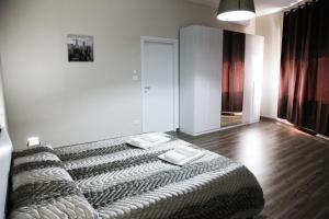 Postel nebo postele na pokoji v ubytování Affittacamere Sogni D'oro