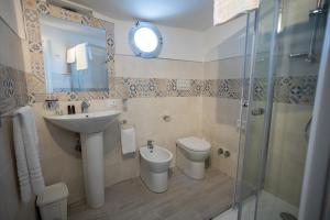 Koupelna v ubytování EXCLUSIVE ROOMS Al Vicoletto