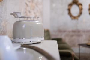 a food processor sitting on top of a counter at Boudoir degli Orti, Unconventional Stay in Borgata, Siracusa in Siracusa