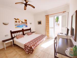 Postel nebo postele na pokoji v ubytování Villa Columbus Family Boutique Hotel