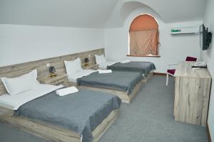 Ένα ή περισσότερα κρεβάτια σε δωμάτιο στο Hotel Muqaddas