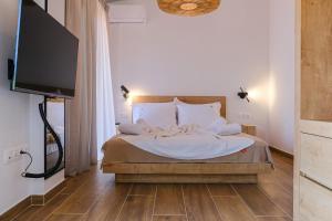 Ένα ή περισσότερα κρεβάτια σε δωμάτιο στο Dekalo Seaside Villa, Kriopigi