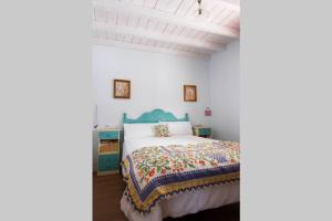 Postel nebo postele na pokoji v ubytování Casa d'Arriba
