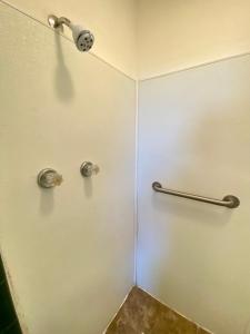 a shower stall in a bathroom with at Skyline Inn in Atlantic City