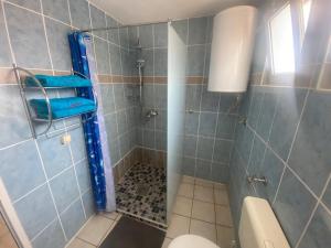 Koupelna v ubytování Apartments Sunpoint + 37 fotografií