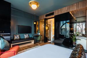 Voodi või voodid majutusasutuse Hotel Marquee Medellín toas