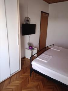 Posteľ alebo postele v izbe v ubytovaní Apartments Lorio