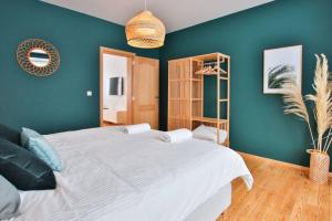 Ein Bett oder Betten in einem Zimmer der Unterkunft Logement L'échasseur à Jambes (NAMUR)