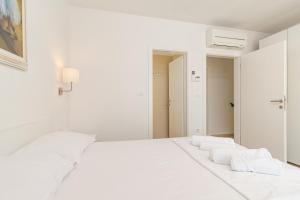 Voodi või voodid majutusasutuse Apartments Anna Liznjan toas