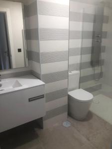 Koupelna v ubytování Apartamento praia Canelas