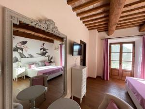 Posteľ alebo postele v izbe v ubytovaní Villa Preselle Country Resort
