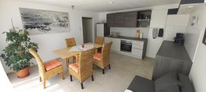 A kitchen or kitchenette at Apartment SeeYou