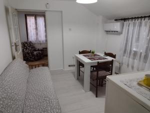 Ένα ή περισσότερα κρεβάτια σε δωμάτιο στο Apartman DM