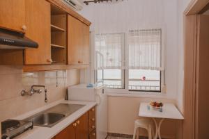 Kuchyňa alebo kuchynka v ubytovaní Apartments Tania