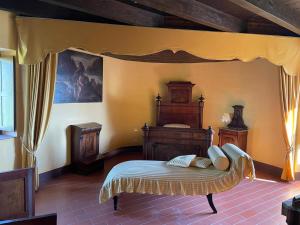 A bed or beds in a room at Il Castello dei Principi Sanseverino