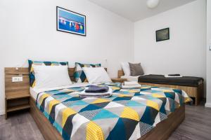 Postel nebo postele na pokoji v ubytování Apartments Jedro