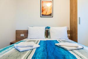 Postel nebo postele na pokoji v ubytování Apartments Jedro