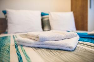 Postel nebo postele na pokoji v ubytování Apartments Jedro