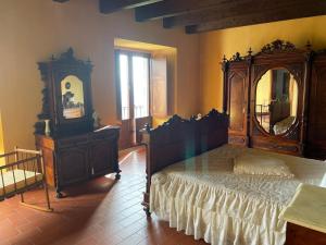 A bed or beds in a room at Il Castello dei Principi Sanseverino