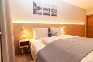 Ein Bett oder Betten in einem Zimmer der Unterkunft Arrivar