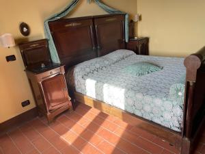 A bed or beds in a room at Il Castello dei Principi Sanseverino