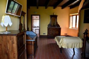 A bed or beds in a room at Il Castello dei Principi Sanseverino