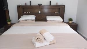 Postel nebo postele na pokoji v ubytování La Casita