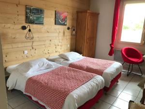 Postel nebo postele na pokoji v ubytování Abel Hôtel