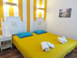 Posteľ alebo postele v izbe v ubytovaní Jho'La Surf Camp