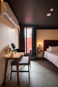 Postel nebo postele na pokoji v ubytování Casa Nada Hotel