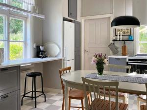 A kitchen or kitchenette at 7 person holiday home in SANDHEM
