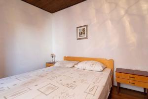 Posteľ alebo postele v izbe v ubytovaní Apartment Kukljica 5