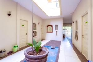 Kép Ardhya Guesthouse Syariah by ecommerceloka szállásáról Sidoarjóban a galériában