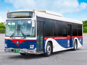 a bus is parked in a parking lot at Oriental Hotel Tokyo Bay in Urayasu