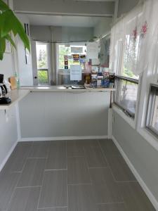 a kitchen with a counter and a counter top at Dollar Inn in Somerset