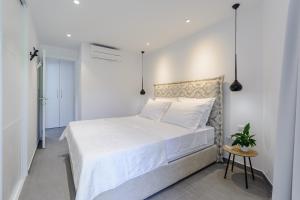 Posteľ alebo postele v izbe v ubytovaní Villa Stone Pearl