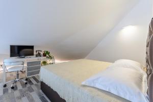 Posteľ alebo postele v izbe v ubytovaní Villa Stone Pearl