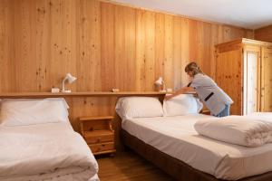 Postel nebo postele na pokoji v ubytování Hotel Meuble' Joli