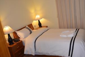 Letto o letti in una camera di Hotel Amaryllis