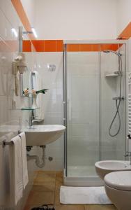 a bathroom with a shower and a sink at B&B & Residence Pozzo Misseo in Matera