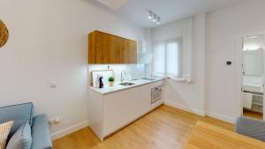 Кухня или мини-кухня в Apartamentos La Casa El Palo
