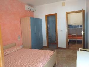 Posteľ alebo postele v izbe v ubytovaní Room in BB - Quadruple room in Pineto - A few meters from the sea