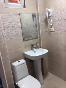 Koupelna v ubytování Chaki Hotel