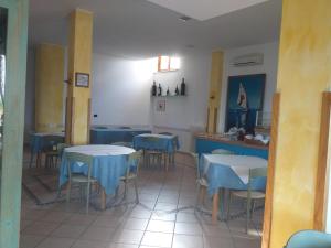 Εστιατόριο ή άλλο μέρος για φαγητό στο Quadruple room in Pineto - Enjoy a relaxing holiday +7 φωτογραφίες