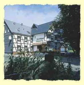 a view of a building with a building at Hotel - Restaurant - Café Forsthaus Lahnquelle in Netphen