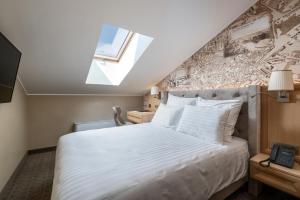 Cama ou camas em um quarto em CALVARY Hotel & Restaurant Vilnius