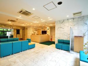 TV a/nebo společenská místnost v ubytování Hotel Koshien