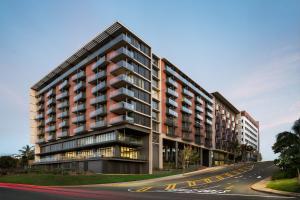 a rendering of an apartment building on a street at Premier Splendid Inn Umhlanga in Durban